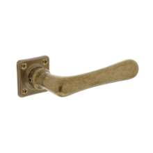 Afbeeldingen van INTERSTEEL Deurkruk Trento met rozet 38x38x7mm messing getrommeld/ebbenhout 0388