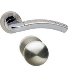 Afbeeldingen van INTERSTEEL Wisselgarnituur links Sharon op rond rozet 7mm nokken met PC plaatjes chroom/nikkel mat 1688