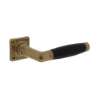 Afbeeldingen van INTERSTEEL Deurkruk Ton 222 met rozet 38x38x7mm messing getrommeld/ebbenhout 0375